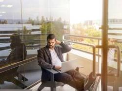 Businessman thoughtful on terrace